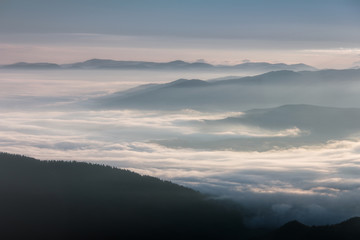 Fototapeta na wymiar Landscape misty mountains in the morning sunlight.