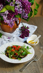 warm salad of baked eggplants, oyster mushrooms, cherry tomatoes and arugula