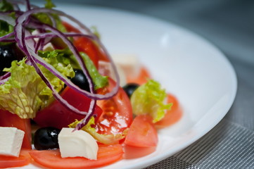 lettuce with tomatoes  cheese  bow and olives