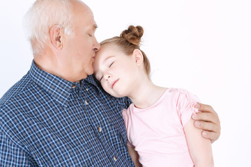 Grandfather spending time with granddaughter 