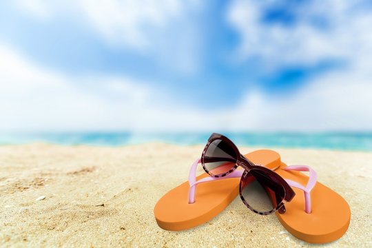 Flip-flop, Beach, Sunglasses.