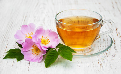 Cup of tea and dogrose