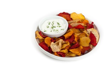 Vegetable Chips Exotic Blend isolated on white. Selective focus.