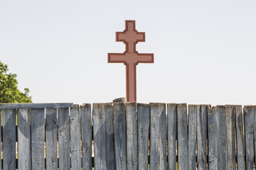 Religious symbol against a wooden protection