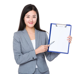 Young businesswoman pen point to clipboard