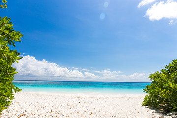 Beautiful crystal clear sea and white sand beach at Tachai island, Andaman, Thailand