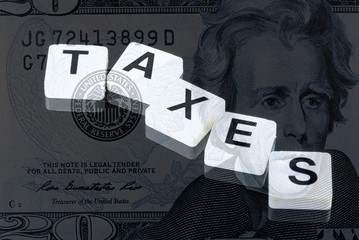 The Word taxes - A Term Used For Business, Finance and Tax Concept