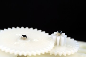White Plastic Gear Wheels - Concept image for working together or team work