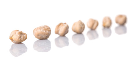Raw chickpeas over white background