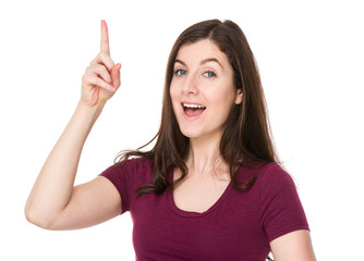 Fototapeta premium Brunette woman finger point up