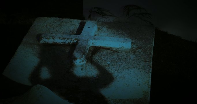 Graveyard at night - scary and spooky background of creepy ghost silhouette