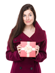 Young woman holding with gift box