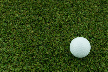 A golf ball on grass, Closeup shoot.