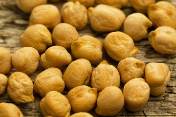 bunch of chickpeas on the old wooden background. Indian cuisine