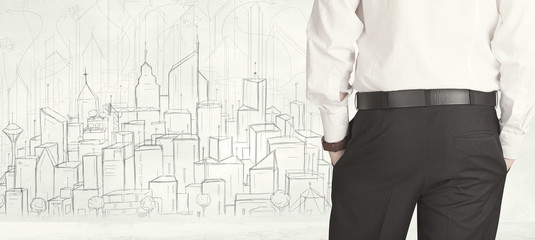 Businessman with drawn city view