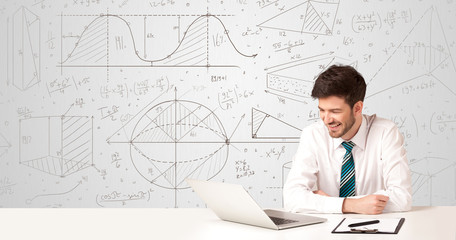 Businessman with business calculations background