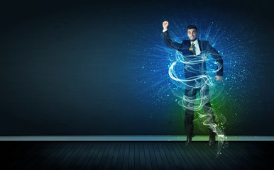 Talented cheerful businessman jumping with glowing energy lines