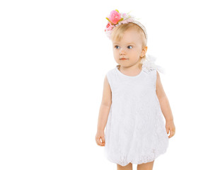 Little girl with floral wreath on head on a white background