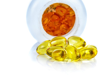 fish oil capsules isolated on the white background