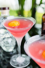 Two glasses with bright refreshing cocktail Cosmopolitan with