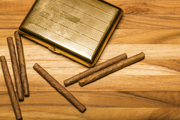 Brass Cigarette Case and Cuban Cigarillos