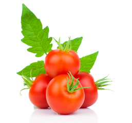  fresh tomatoes with green leaves isolated on white background