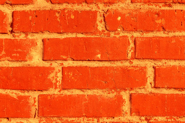 Obraz premium Brick texture of orange color with scratches, attritions and cracks
