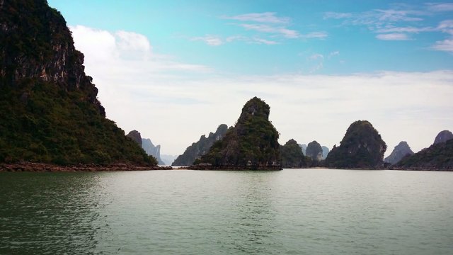 Halong Bay Vietnam uhd 4K video. Ha Long tourist travel destination panoramic landscape view