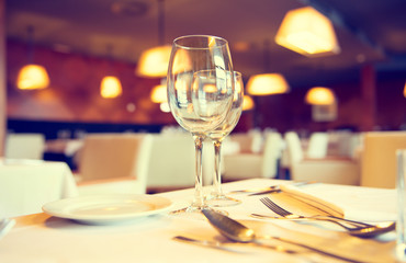 Served dinner table in a restaurant. Restaurant interior