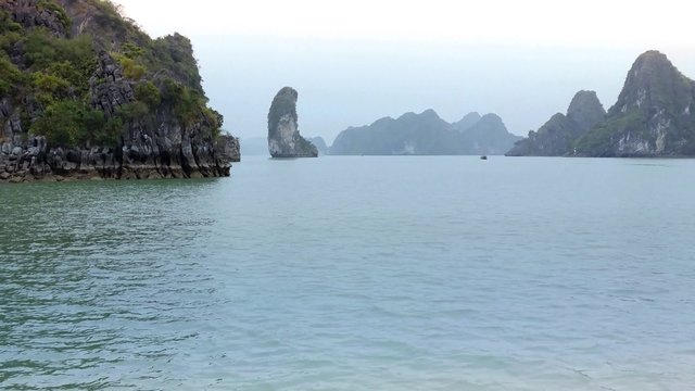 Halong Bay Vietnam uhd 4K video. Ha Long tourist travel destination panoramic landscape view 