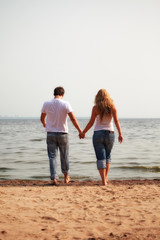 couple walking on a beach