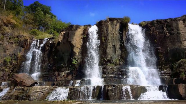 Pongour Falls waterfall in Dalat Vietnam. Scenic mountain river landscape 4K ultra high definition video footage 