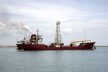 transport ships   are at sea in fine weather