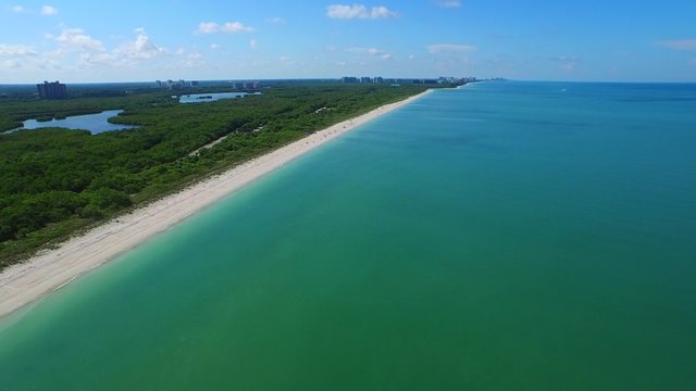 Aerial video Barefoot Beach luxury beachfront estates