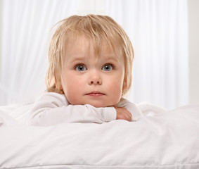 Little girl in the bed
