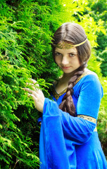 elf princess in green garden