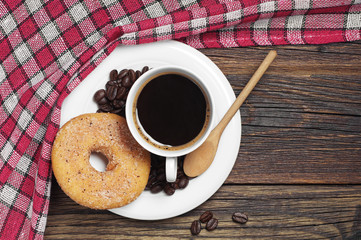 Coffee cup and donut