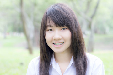 thai student teen relax Sitting On Park