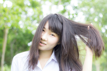 Fototapeta premium thai student teen relax Sitting On Park