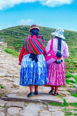 Bolivian  women in traditional clothes on the street