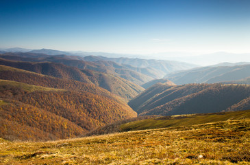 Autumn landscape in mountain valleys.