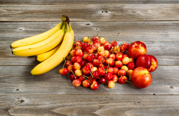 Fresh fruit displayed on rustic wood