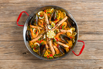 Paella with seafood and vegetables