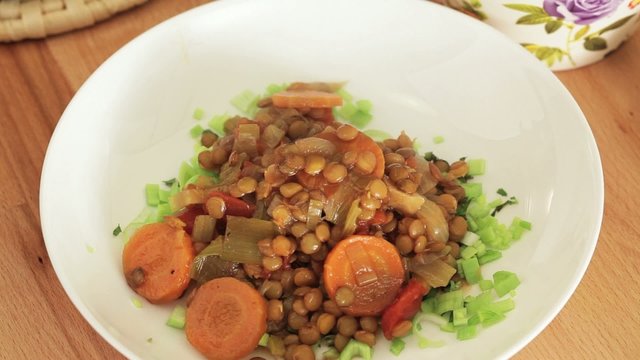 Stewed lentils poured into bowl - hd 1080 stock footage