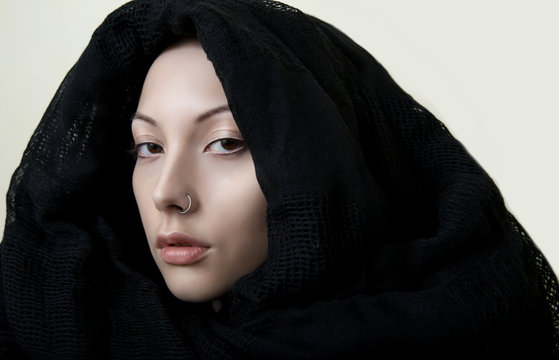 Girl With Perfect Skin In A Black Scarf