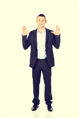 Businessman pressing abstract screen