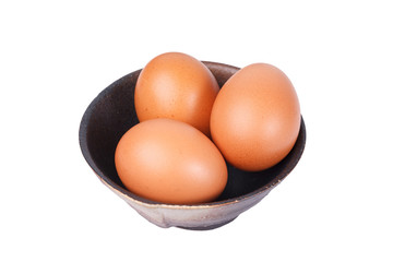 Eggs in a bowl isolate on white