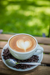 Latte Art coffee with coffee bean