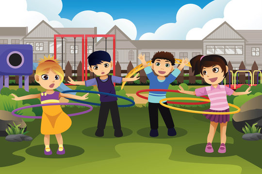 Children playing hula hoop in the park