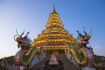Fototapeta na wymiar Twilight light at Chinese temple - Wat Huay pla kang (thai name) major religious attractions of Chiang Rai, Thailand.